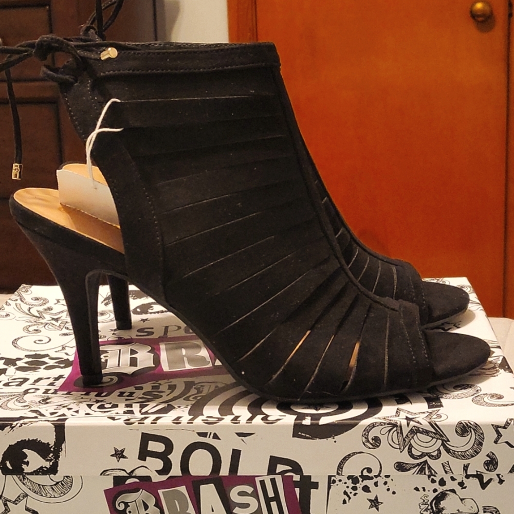 Women's high heel shoes. Brand new with tags on and box.